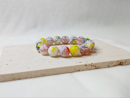 colorful beaded bracelet, handmade jewelry, artsy bracelet, splatter paint beads, bold statement jewelry