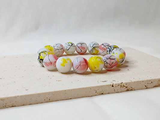 colorful beaded bracelet, handmade jewelry, artsy bracelet, splatter paint beads, bold statement jewelry