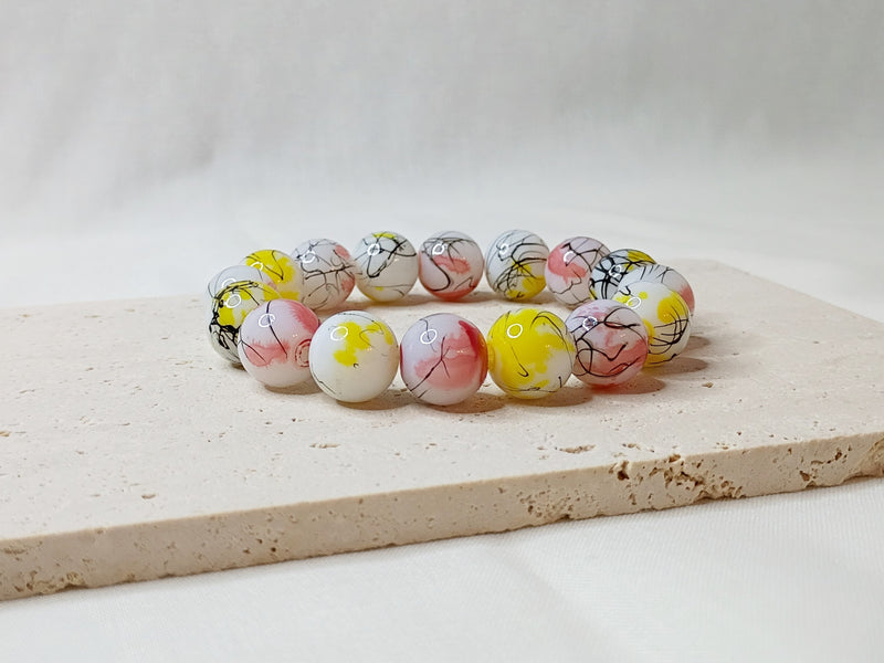 colorful beaded bracelet, handmade jewelry, artsy bracelet, splatter paint beads, bold statement jewelry