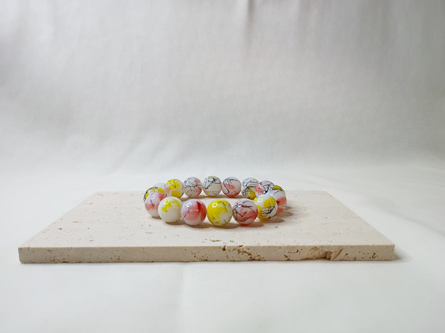 colorful beaded bracelet, handmade jewelry, artsy bracelet, splatter paint beads, bold statement jewelry