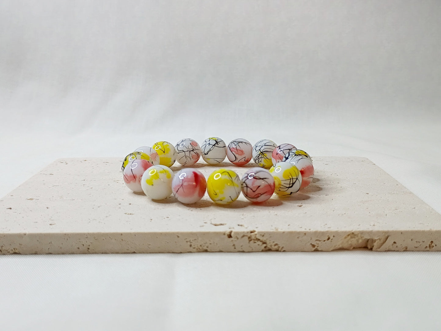 colorful beaded bracelet, handmade jewelry, artsy bracelet, splatter paint beads, bold statement jewelry
