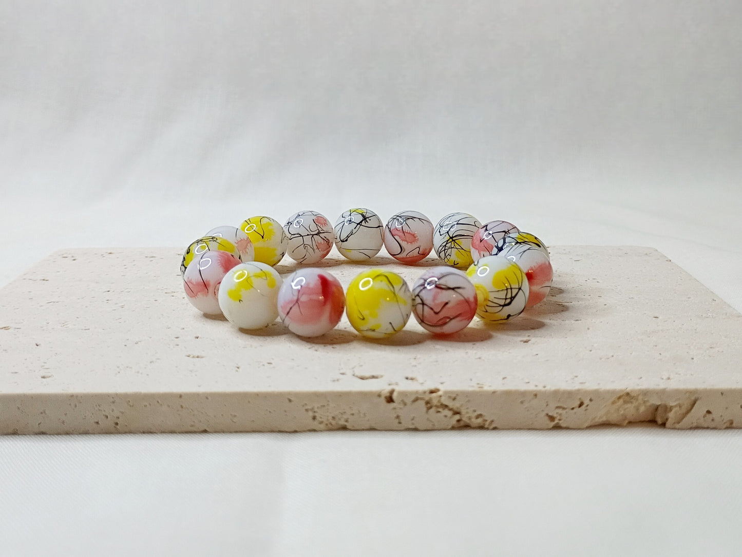 colorful beaded bracelet, handmade jewelry, artsy bracelet, splatter paint beads, bold statement jewelry