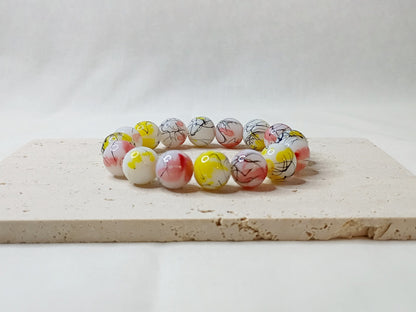 colorful beaded bracelet, handmade jewelry, artsy bracelet, splatter paint beads, bold statement jewelry