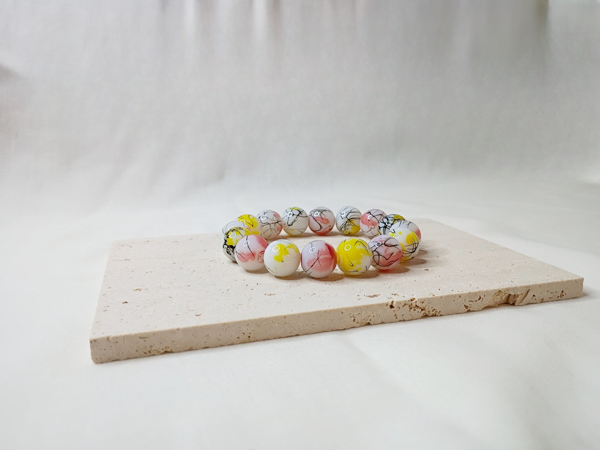 colorful beaded bracelet, handmade jewelry, artsy bracelet, splatter paint beads, bold statement jewelry