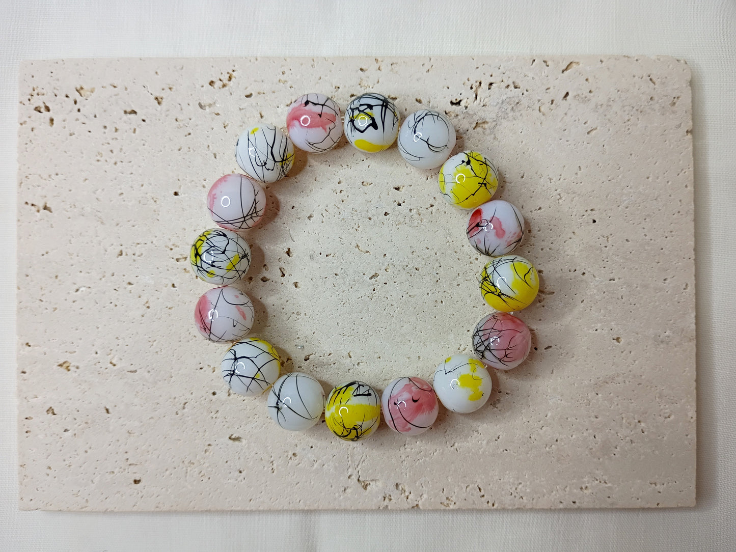 colorful beaded bracelet, handmade jewelry, artsy bracelet, splatter paint beads, bold statement jewelry
