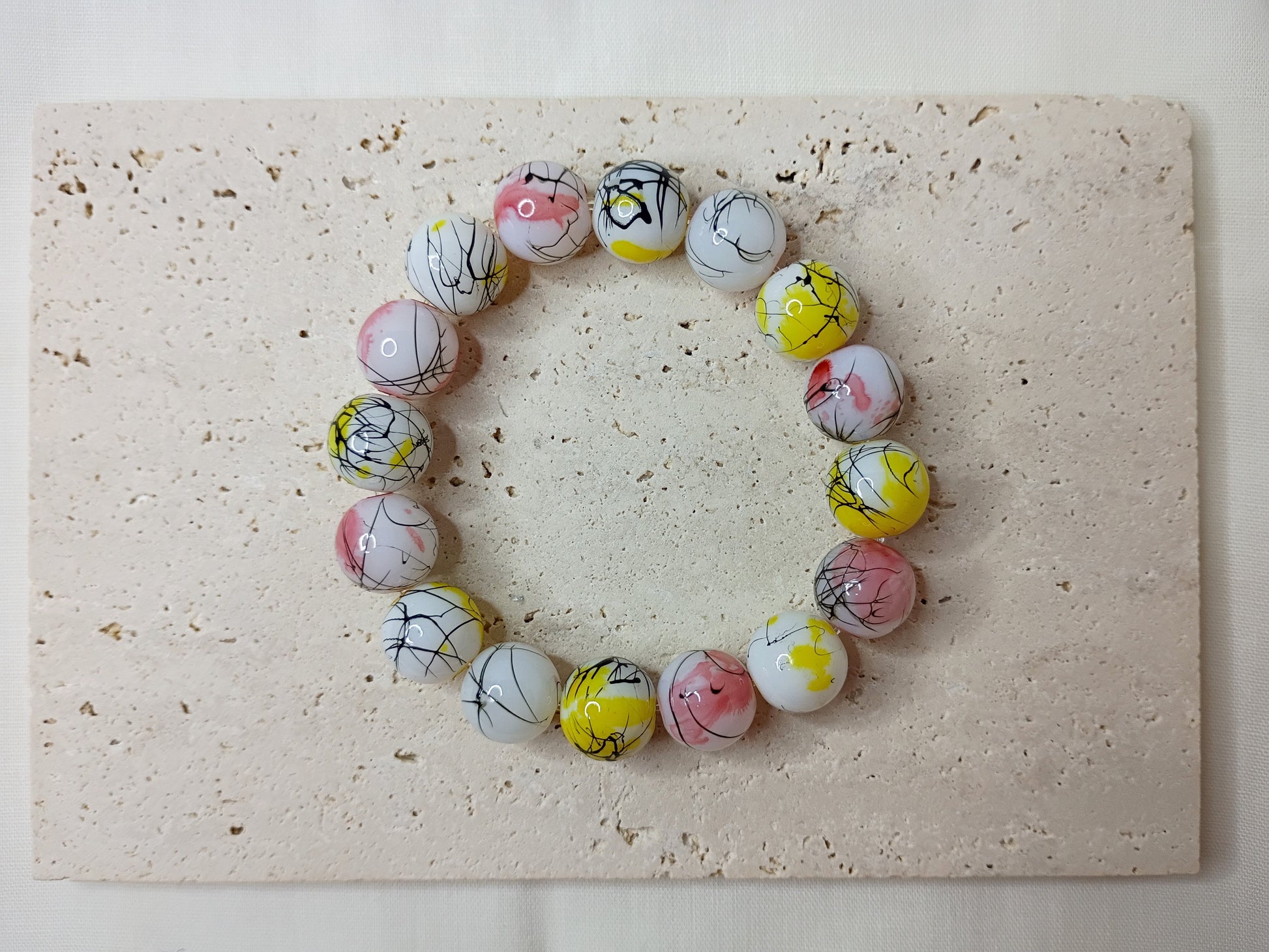 colorful beaded bracelet, handmade jewelry, artsy bracelet, splatter paint beads, bold statement jewelry