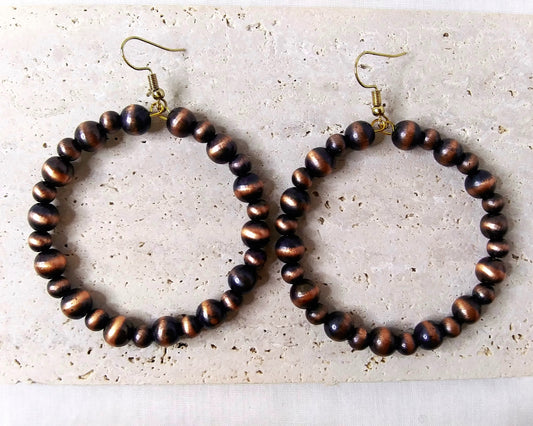 Wooden hoop earrings with gold accent