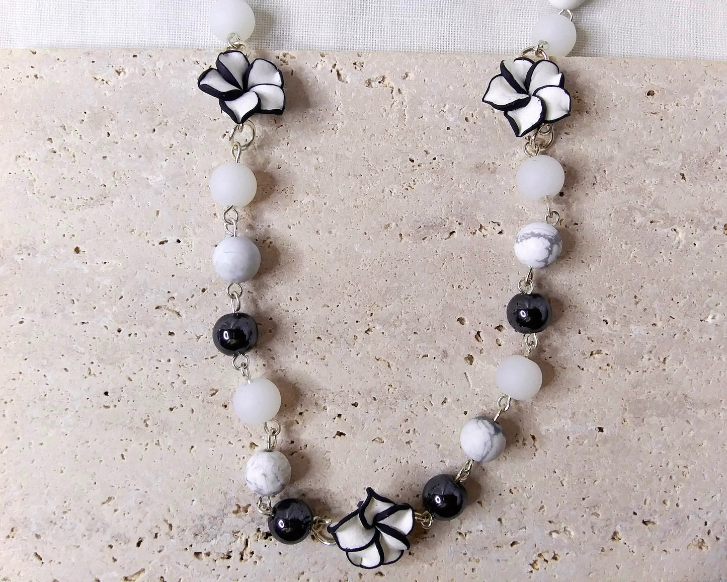 Gemstone Necklace, Silver Necklace, Hematite, howlite, white glass beads. Poly clay flower shape beads