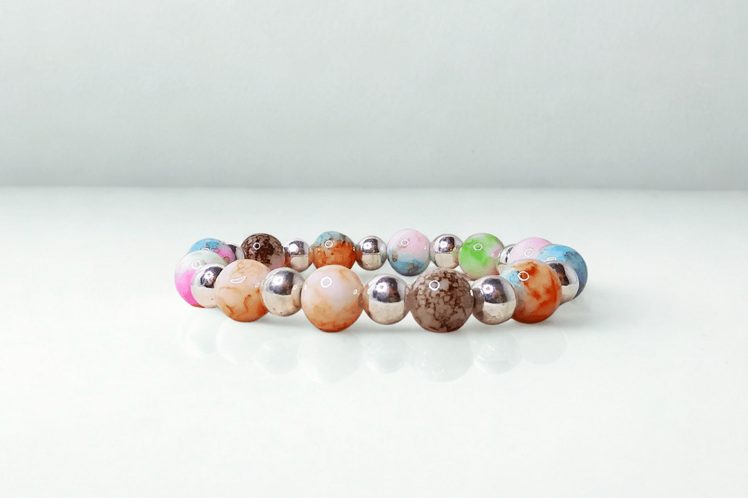 Multicolored beaded bracelet on a white background