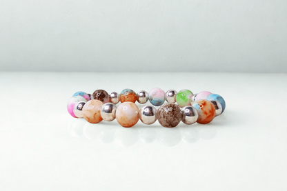 Multicolored beaded bracelet on a white background