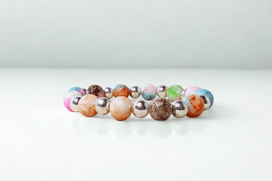 Multicolored beaded bracelet on a white background