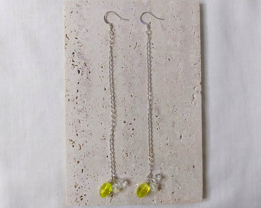 Long silver earring with yellow glass beads